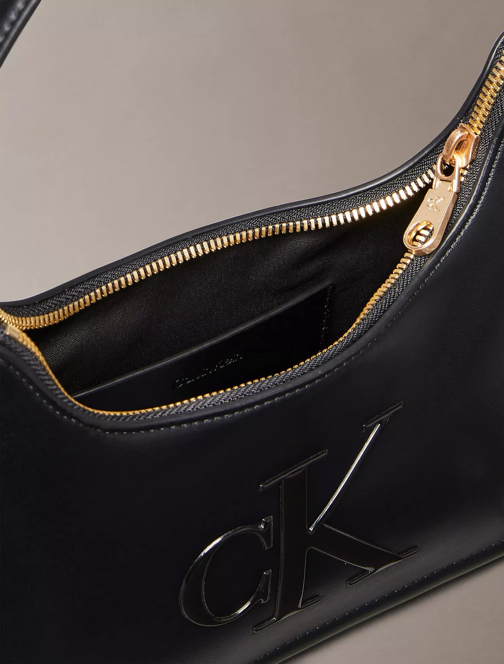 Embossed Monogram Shoulder Bag