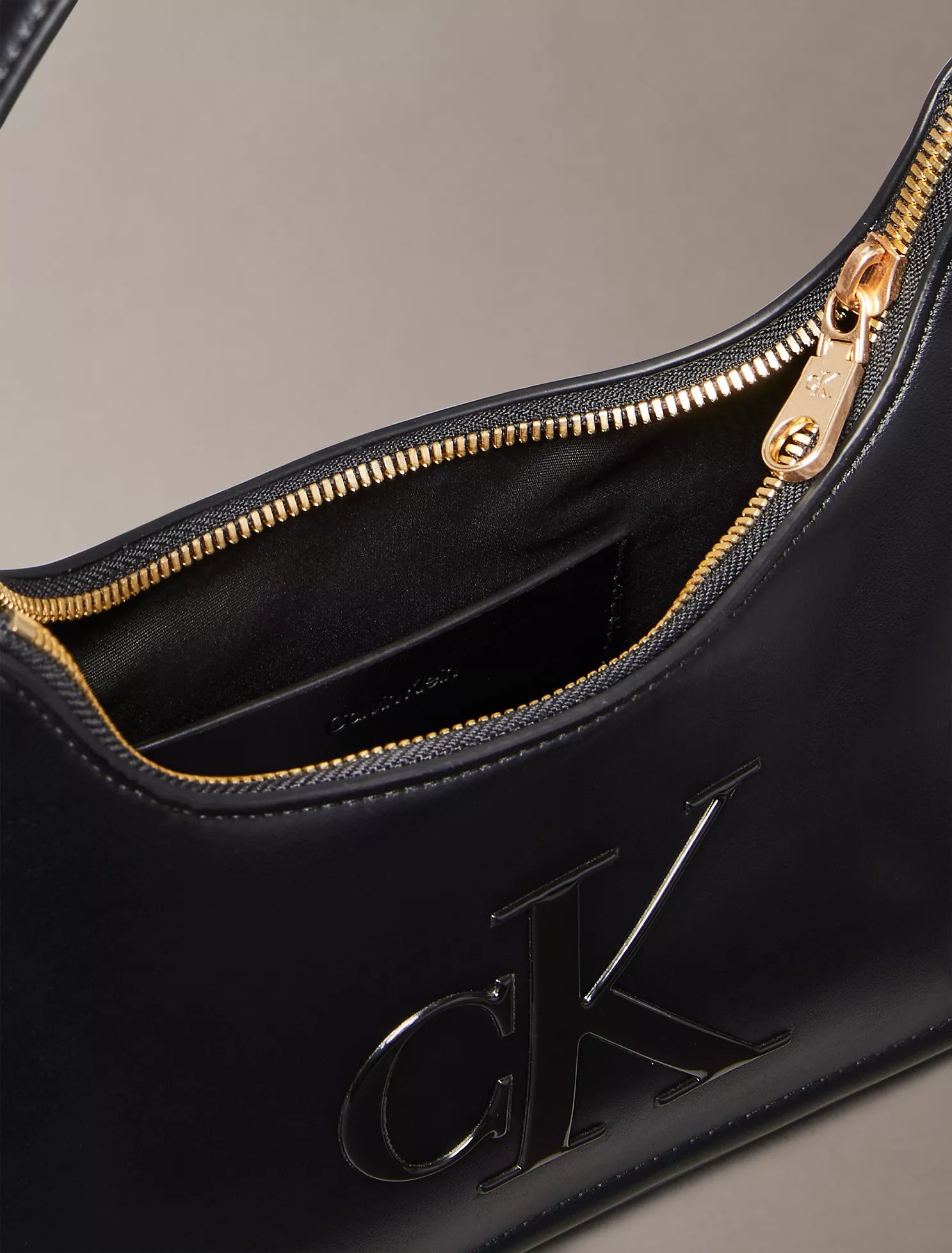 Embossed Monogram Shoulder Bag